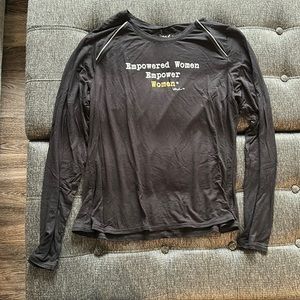 Women’s long sleeve Tee. “Empowered women empower women” color black. Size LG